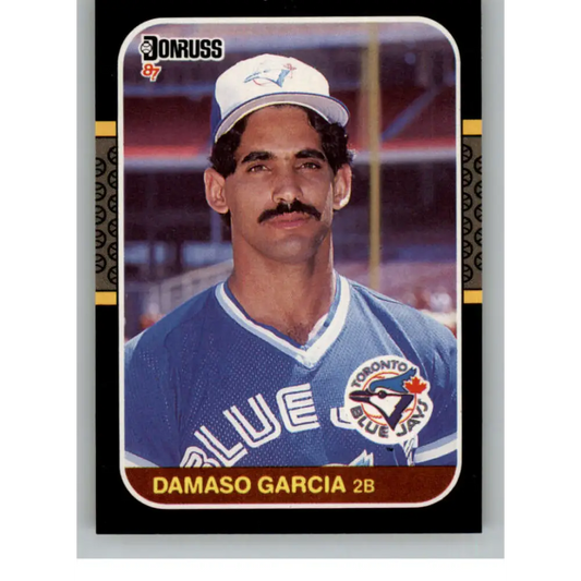 1987 Donruss #614 Damaso Garcia EX Excellent Toronto Blue Jays Baseball Card  Image 1