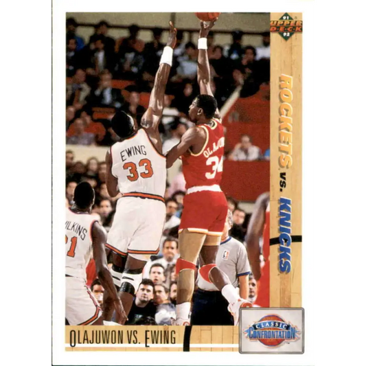 1991-92 Upper Deck #33 Hakeem Olajuwon/Patrick Ewing CC NM-MT Houston Rockets/New York Knicks Basketball Card Image 1