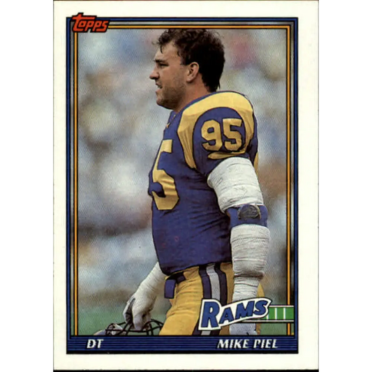 1991 Topps #529 Mike Piel NM-MT Los Angeles Rams Football Card  Image 1