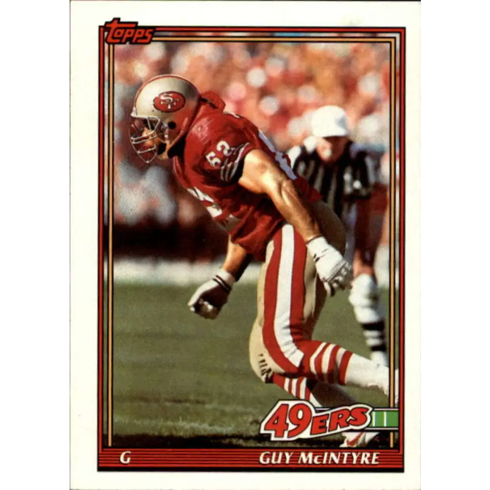 1991 Topps #61 Guy McIntyre NM-MT San Francisco 49ers Football Card  Image 1