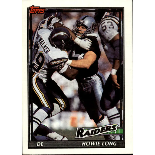 1991 Topps #95 Howie Long NM-MT Los Angeles Raiders Football Card  Image 1